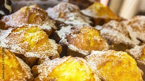 A muffin behind the glass window of the cafe. Fresh baked muffin on the counter, animation.