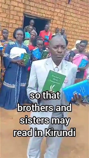 Pastors Handing Out Books in Burundi Mobile