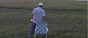 Farmer calls cattle in the most awesome way