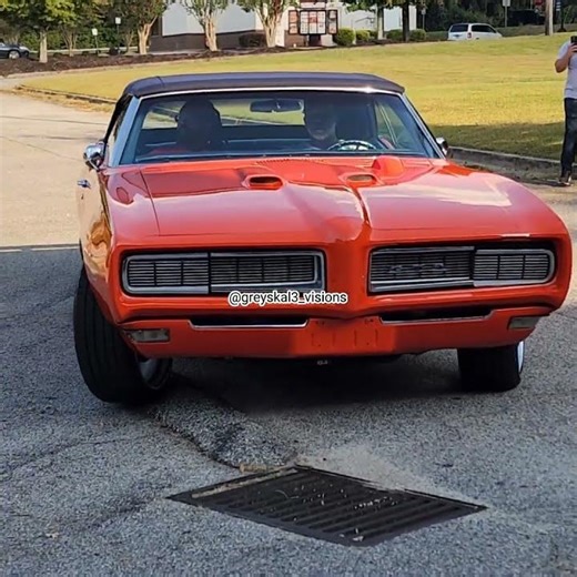 True Pontiac Gto in its factory color Carousel Red