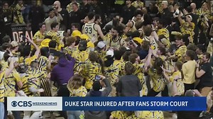 Duke Basketball’s Kyle Filipowski suffered a sprained ankle Saturday in the court-storming chaos following an upset loss to Wake Forest. His injury has players and coaches alike questioning the rules around post-game celebrations. | CBS Evening News