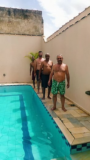 Fun Pool Jumping with Friends on a Sunny Day