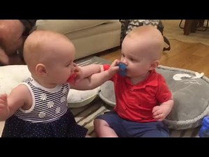 Twin Babies Fight Over Pacifiers