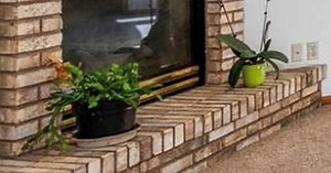 Cómo pintar una chimenea de ladrillo encalada y actualizada DIY