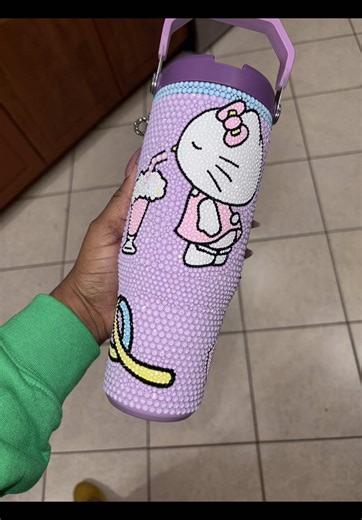 Hello Kitty light purple rhinestone tumbler. 30 oz Stanley . . . . . . . . . . . . . . . . . . . #bling #rhinestones #customized #hellokitty #purplelove
