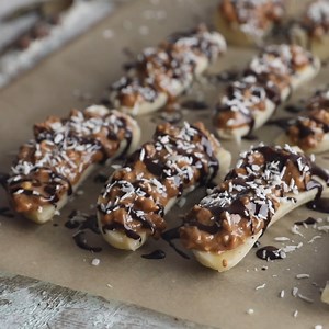 20K views · 138 reactions | These frozen banana snacks are gluten-free, dairy-free, vegan, and low-calorie - a perfect snack for summer! Healthy, nutty, and coconutty, they’re a great ice cream substitute. | All Nutritious | Facebook