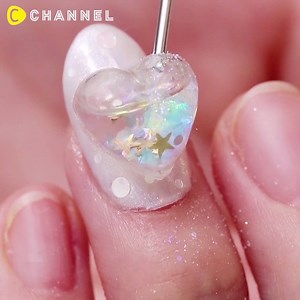 7.5M views · 13K reactions | Water Sparkle Snow Dome Nail Art via C...