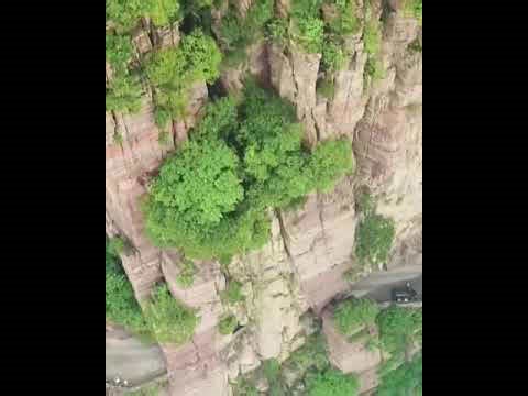 Journey Through China’s Famous Guoliang Tunnel Road