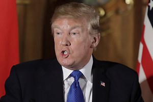 Trump tries to peddle U.S. weapons at Tokyo press conference