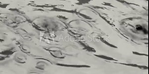 splashing water that occurs when rainwater falls on a puddle