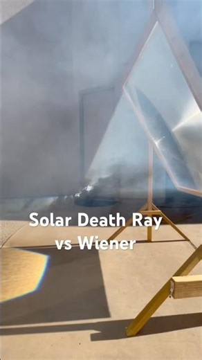 Wiener combusts under Solar Death Ray #deathray #solar #food #bbq