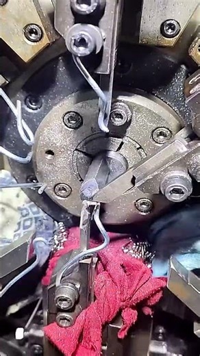Spring processing machine, wire bending machine
