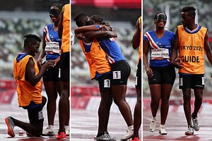 Watch moment Paralympic guide proposes to blind athlete on track after race