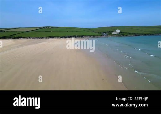 River Camel, Cornwall, England: DRONE VIEWS: The drone flies over a beautifully-coloured riverside beach heading towards St George's Cove. The River Camel rises on the edge of Bodmin Moor and is the second longest river wholly in Cornwall Stock Video Footage - Alamy