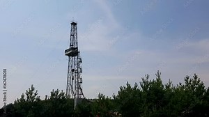 Drilling rig with strong vibration rotates and drills a hole in the ground. Geological research