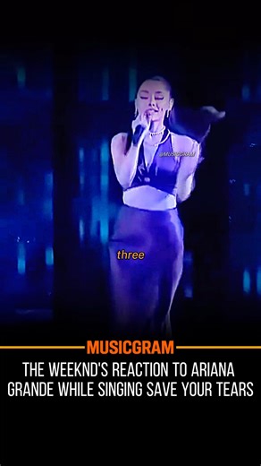 Musicgram on Instagram: "The Weeknd’s Reaction to Ariana Grande Singing “Save Your Tears” 😭🎤 Watching Ariana Grande perform Save Your Tears live is a moment in itself, but The Weeknd’s reaction takes it to another level. From the very first note, you can see the genuine awe in his eyes — a mix of admiration, surprise, and pure respect. Every high note, every run, every emotional inflection seems to hit him right in the heart. It’s more than just a reaction; it’s a reminder of how powerful live