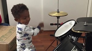 Little Boy Plays Drums