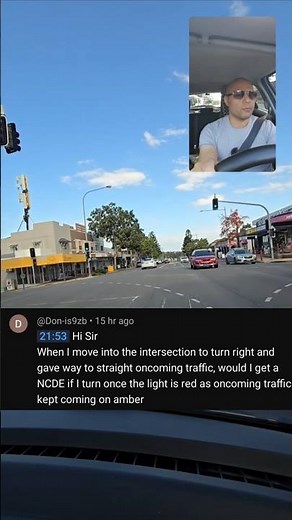 What should you do if you're in the middle of the intersection when the light turns red?