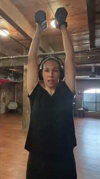 Quick demo with form tips for standing dumbbell overhead press