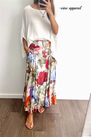 171K views · 442 reactions | The Sandra Maxi Skirt is a lovely length and a really nice fit - it has a flat front and elastic at the back so it drops perfectly. Light and just nice on x x Shop HERE: Vintage Garden Floral: vineapparel.com/products/sandra-maxi-skirt-vintage-garden-floral Noir Bloom: vineapparel.com/products/sandra-maxi-skirt-noir-bloom Kym wears an 8 and is 175cm, Ash wears a 14 and is 170cm x | Vine Apparel | Facebook