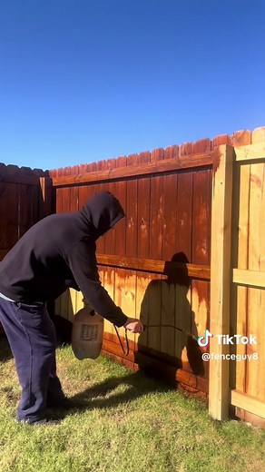 DIY Fence Staining with a Pump Sprayer