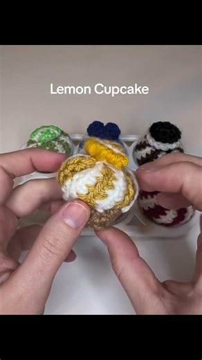 Crocheted cupcakes. Could make some cute keychains.