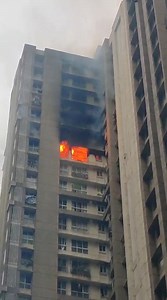 BREAKING NEWS - A fire broke out at the Lodha Amara residential complex in Thane, specifically in the E Wing of the Casa Aurelia building on the 11th floor. The fire quickly spread to several floors above and below the initial location. | Amchi Mumbai Online