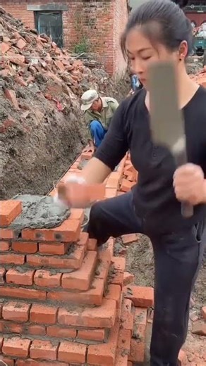 This woman shows how to properly lay red bricks and become a professional mason #construction #brick