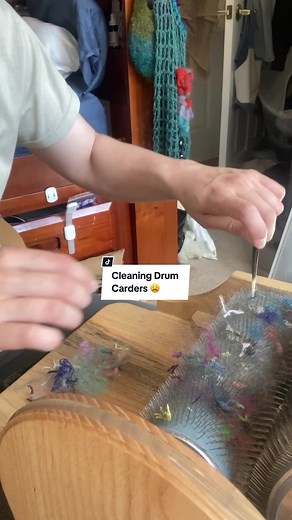 Just like how setting up a new spinning wheel bobbin is time consuming as a beginner, cleaning the drum carder before your next blend can also be a tedious and time consuming task- it gets better though! ☺️ #drumcarder #satisfying #foryou #fiberart #diy #handspunyarn #makingyarn #artbatt #artyarn #upcycled