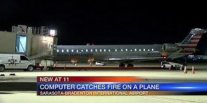 Computer catches fire on plane at SRQ Airport