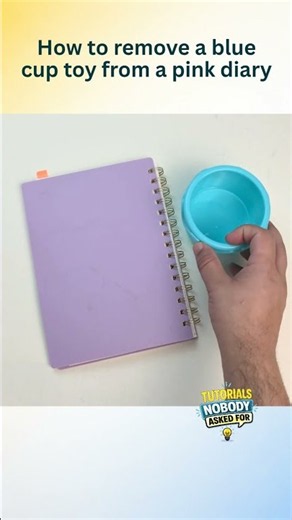 How to remove a blue cup toy from a pink diary