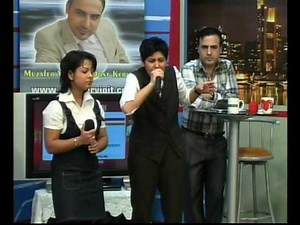 muzafer yigit ile dost kervani cansever ve romana 2010.wmv