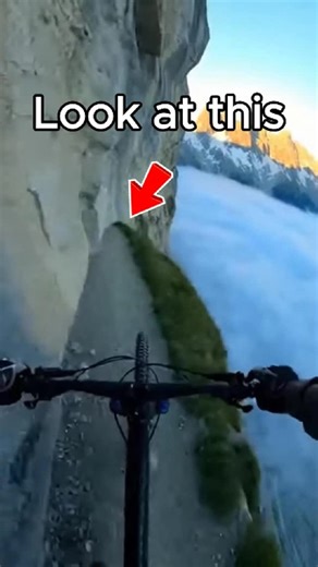 ANY MEDIA on Instagram: "Heart-Stopping Mountain Bike Fall Caught on GoPro Moab, UT — February 4, 2025 A breathtaking extreme mountain biking ride near Moab turns into a heart-stopping survival moment when a seasoned rider loses control on a razor-thin cliffside trail and plunges over the edge—only to survive. This dramatic scene is captured from a helmet-mounted GoPro, delivering an intense first-person perspective of danger, adrenaline, and quick thinking. The video opens with two bikers ridin