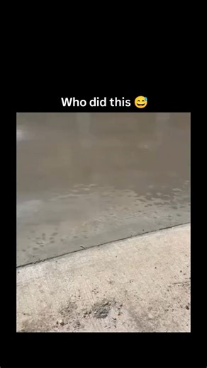 Lucky Clips on Instagram: "This video is a lighthearted and humorous clip showing a construction worker's playful reaction to a job well done. Video Summary The Setting: The video begins by showing a large area of freshly poured, smooth, and wet concrete. The Interaction: A person filming says, "That concrete looks good" and "Who did this concrete?". The "Celebration": A worker, seen wearing a grey sweatshirt, jeans, and a cap, is shown leaning against a building before walking out onto the dry 