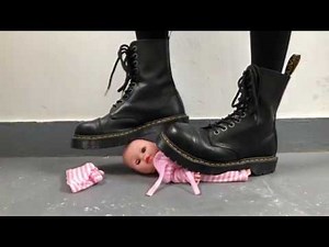 Caring baby under Dr. Martens (boots crush | trample doll)