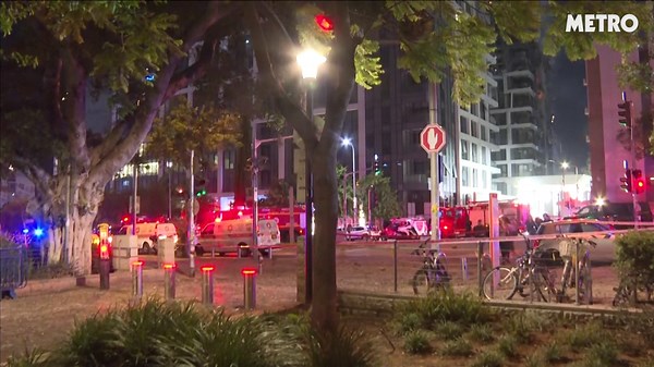 Fires rage in buildings hit in Tel Aviv strike