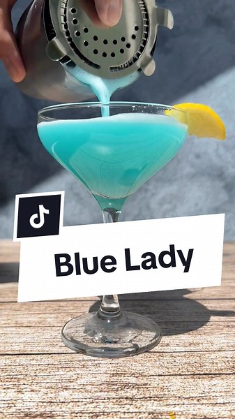 Blue Lady Cocktail Recipe: Gin, Blue Curacao, and Lemon Juice