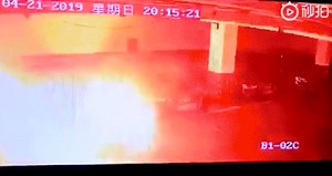 Car unexpectedly bursts into flames in parking lot