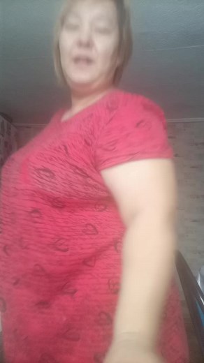 Engaging Dance Movements in Stylish Red Dress