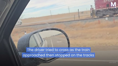 Train smashes through semi-trailer stopped on level crossing in Canada