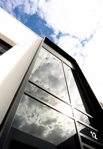 A glimpse of our two piece 200x50mm matte black aluminium battens, used for these window shrouds in Williamstown North. Get in touch for more information. www.duraclad.com.au - 1300 609 411