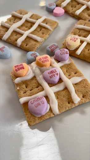 18K views · 93 reactions |  Get ready to add a playful twist to your Valentine’s Day with these Tic-Tac-Toe Graham Crackers!  https://liketk.it/55pis They’re not only adorable and fun to play with, but they’re also a breeze to whip up. Perfect for a lunchbox surprise or a festive party treat—they’re sure to score big with the kids!#ValentinesDaySnacks #ValentinesDayTreats #ValentinesDayParty #TicTacToe #valentinesdaytreats | YWM Family | Facebook