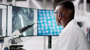 Research Lab Scientist Using Computer