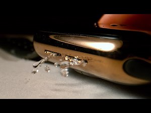 Slow motion video of an Apple Watch ejecting water