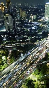 Aerial View City Time Lapse at Night in Car Traffic Transportation