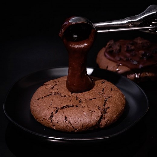 Crumbl on Instagram: "Double Fudge Brownie is NEW and IMPROVED 🤩 Topped with a thicker glaze and even MORE brownie bites, you won't want to miss out on Double Fudge Brownie 🎉 Where are our chocolate lovers at!? 👇 #CrumblCookies"