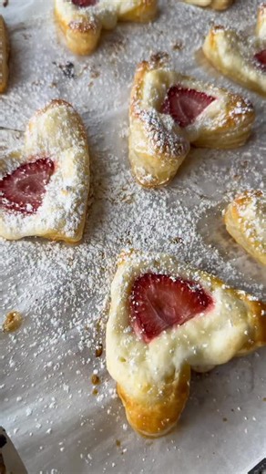 Sarah marie on Instagram: "Strawberry cream cheese puff pastries! Perfect for Valentine’s Day! Ingredients: One package of puff pastry (2 sheets of dough) 8oz cream cheese 1/2 cup sugar 1 tbsp lemon juice * Powdered sugar for sprinkling Sliced strawberries Egg wash: 1 egg 1 tbsp water How to: Thaw puff pastry. Add one sheet on a parchment lined pan and open it up like a book. Use a heart shaped cut out and cut out as many heart shapes as you can. Place back on the parchment lined pan. Use a knif