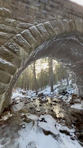 Hiking under one of Acadia National Park’s famous arch bridges that hold up the carriage roads ☺️❄️♥️ Acadia National Park is home to one of the most thoughtfully designed road systems in any U.S. park: the historic Carriage Roads and their iconic stone arch bridges Built between 1913 and 1940 by John D. Rockefeller Jr., the Carriage Roads were designed for horse-drawn carriages, not cars. Rockefeller wanted visitors to experience Mount Desert Island slowly, quietly, and in harmony with the land