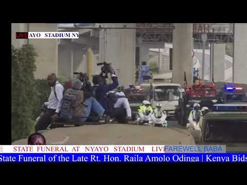 Kenyans receiving Raila's body at Nyayo stadium for the state funeral service.