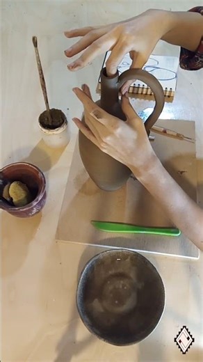 Adding a handle to a narrow neck pot | hand building pottery #potteryshorts #potterywheel